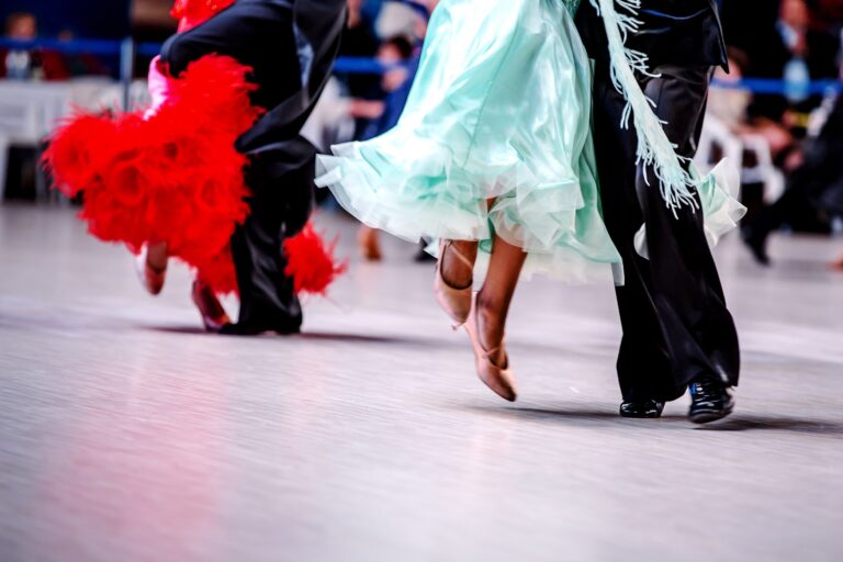 pairs of dancers athletes indoors dance competitions